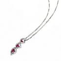 9ct White Gold Diamond and Treated Ruby Three Stone Pendant